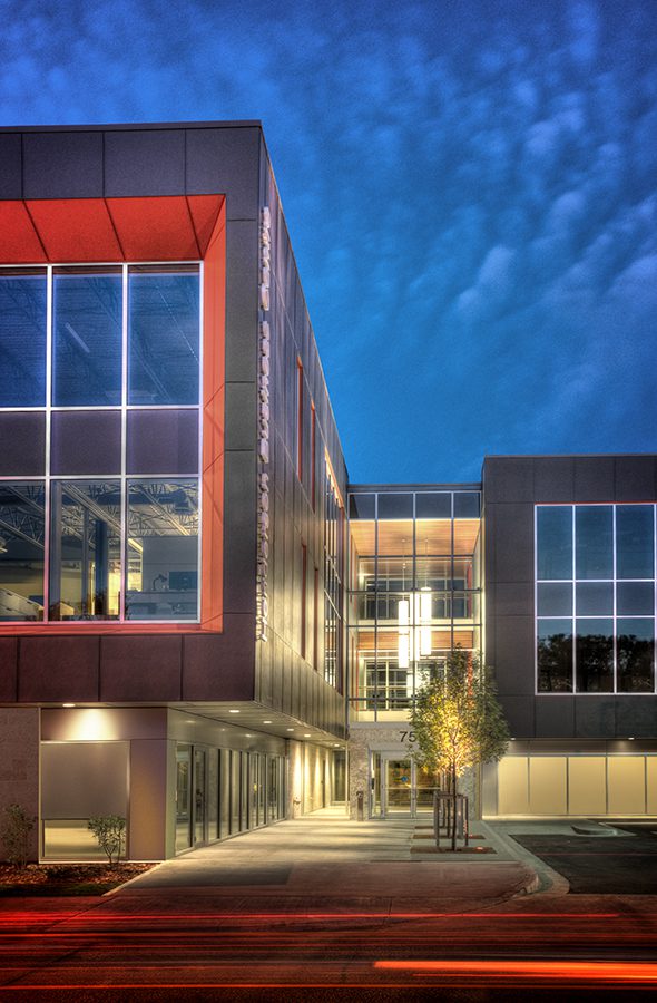 An exterior night perspective of the Henderson Business Centre lobby.
