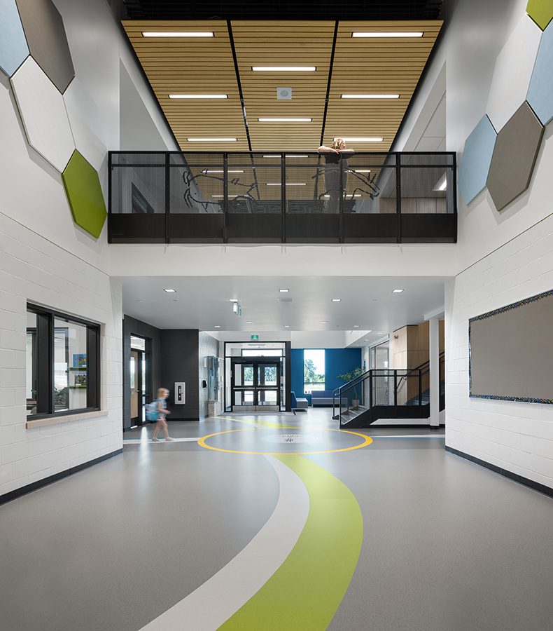 Ecole Templeton Mezzanine showing students on both levels of the Student Commons.