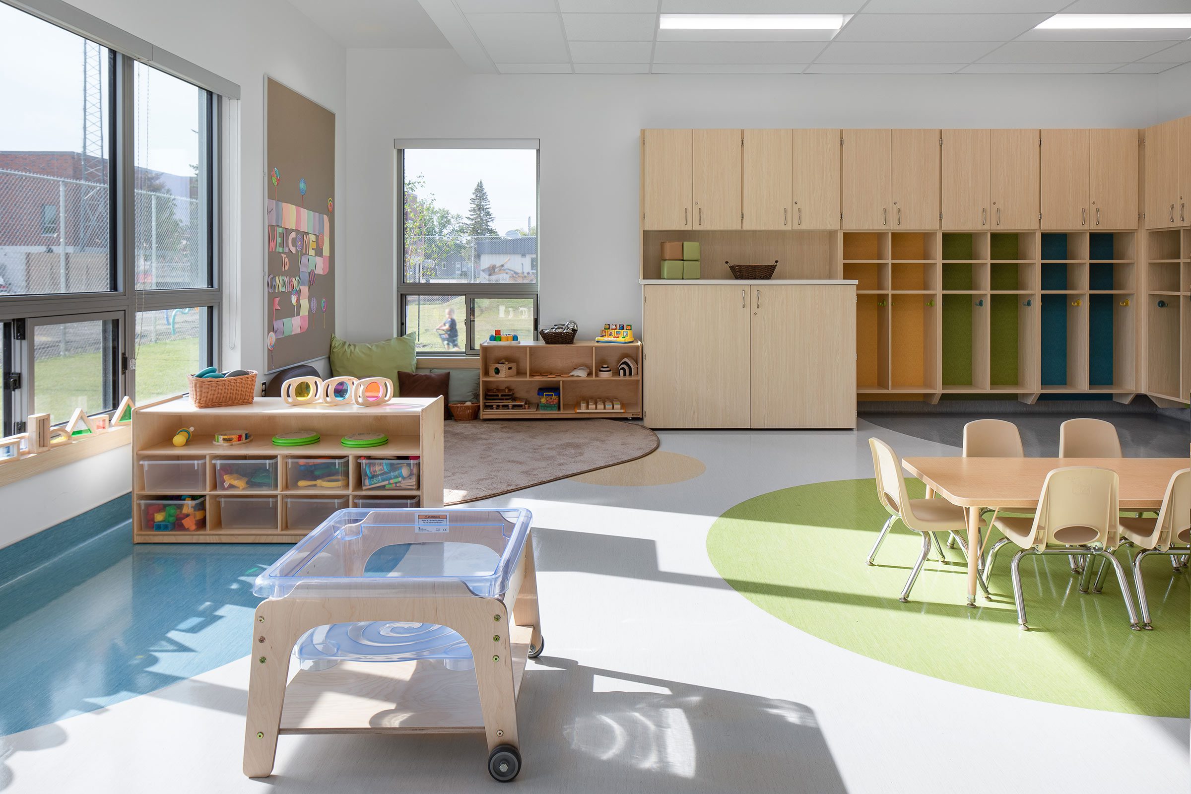 Daycare interior with sunlight filling the room.