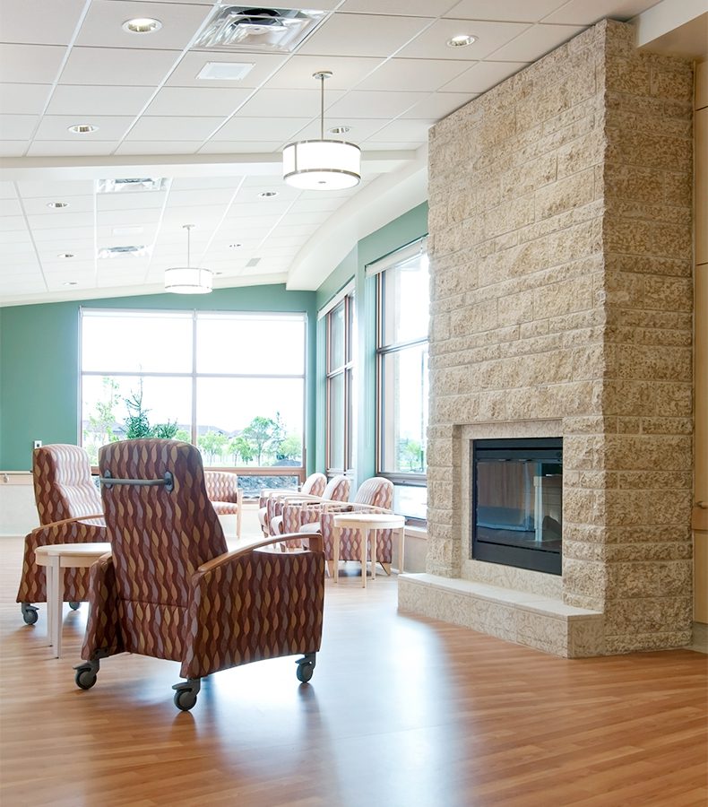 Southeast Personal Care Home lounge with fireplace.