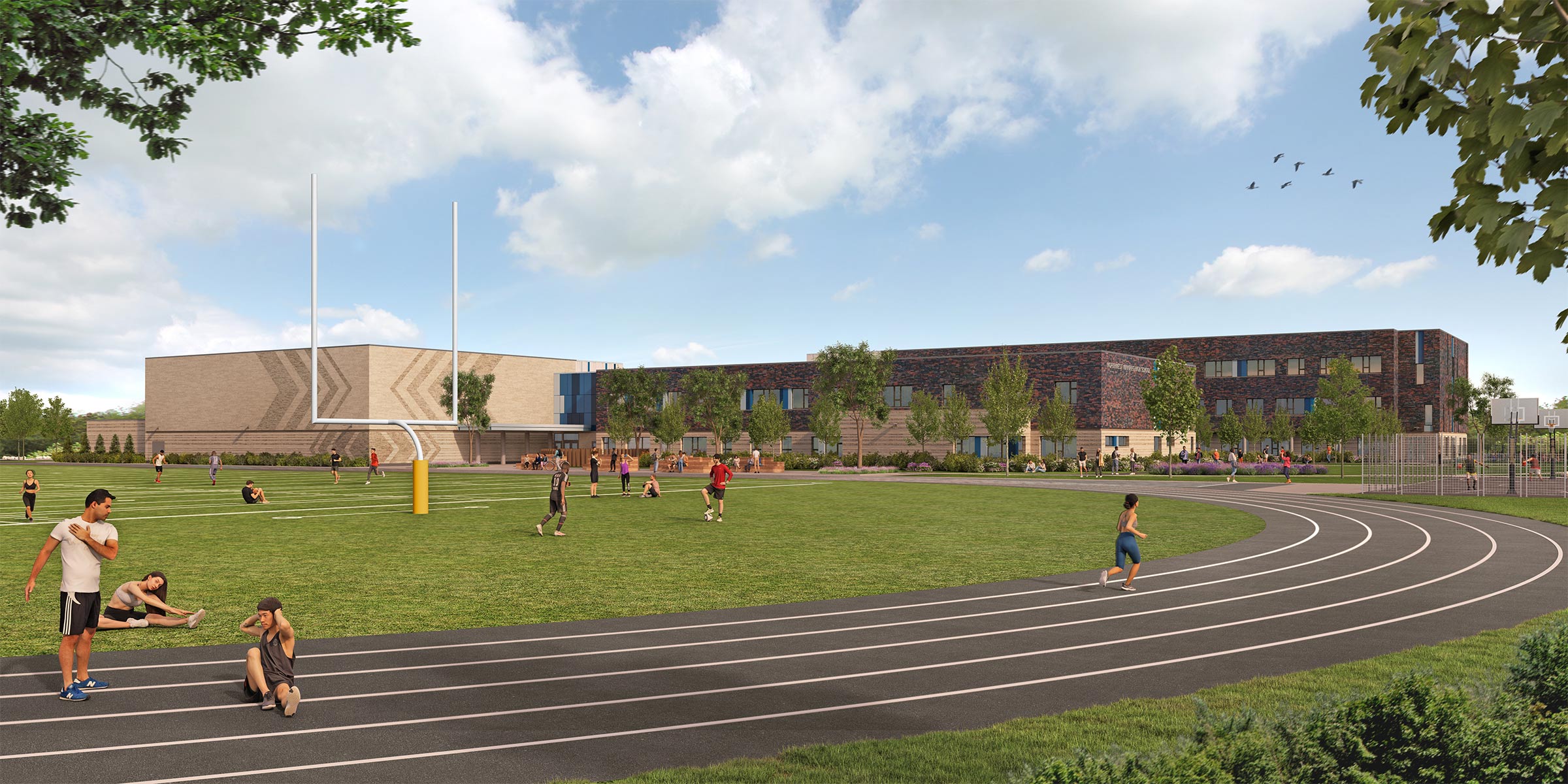 Northwest Winnipeg High School Exterior View showing the outdoor track and play fields.