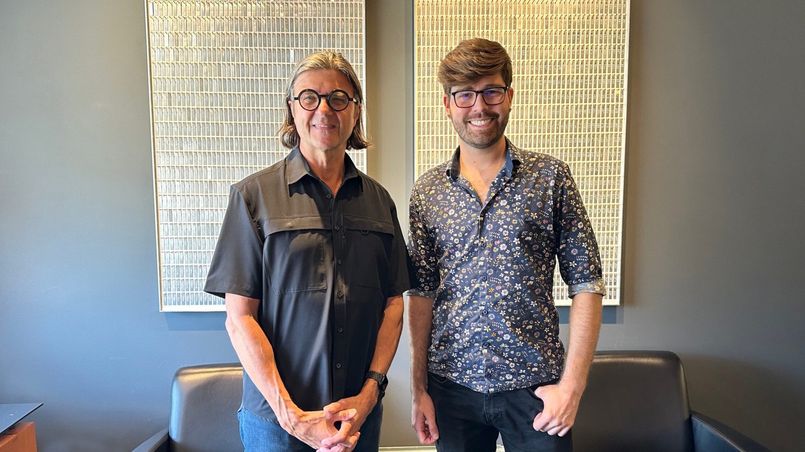 Senior Advisor and past firm principal Terry Danelley with Danton Derksen, 2023 Mel Michener Architectural Fellowship recipient, in the LM-ESP board room.